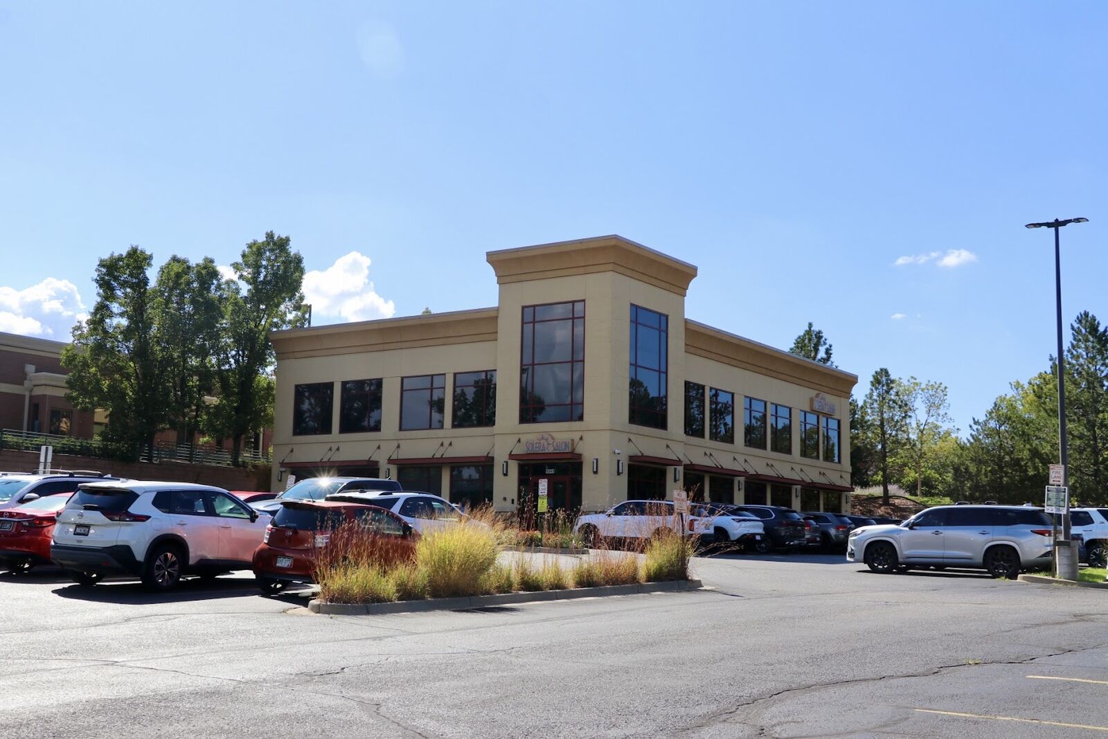 Exterior of the 9049 Forsstrom Dr office building in Lone Tree, CO with free surface parking