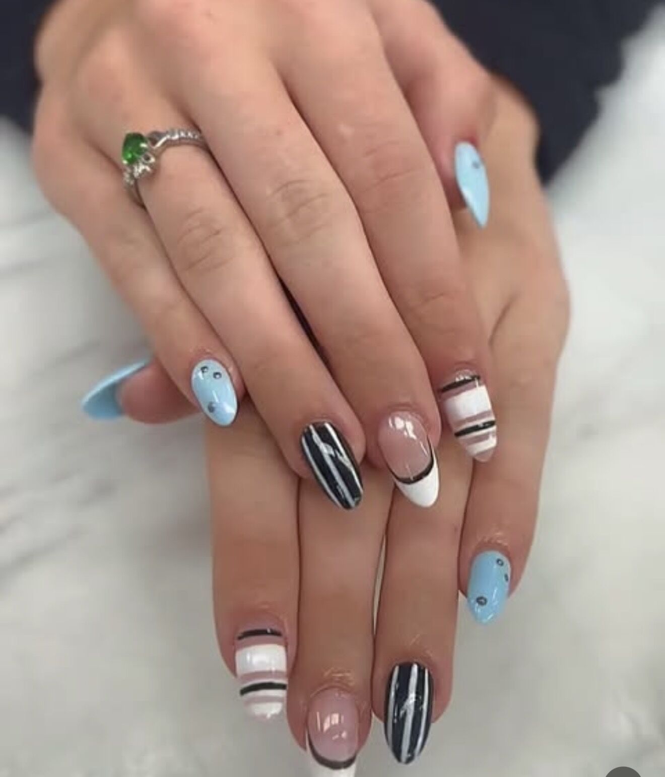 Almond nails with baby blue tips and black and white stripe accents, Lone Tree nail studio