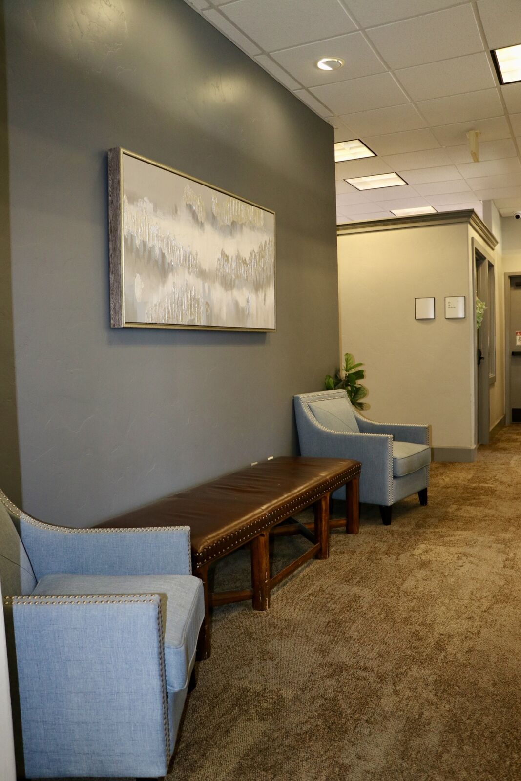 Hallway seating area in the Lone Tree office building that houses Ni Hao Nail Studio